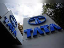 Tata Motors logos are seen at their flagship showroom before the announcement of their Q3 results in Mumbai