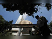 A man walks past the Bombay Stock Exchange (BSE) building in Mumbai