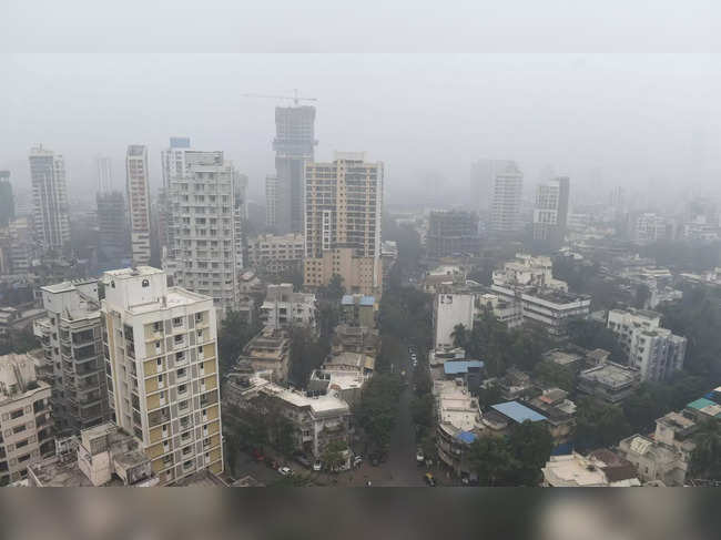 Mumbai: City skyline engulfed in heavy smog,  in Mumbai. (PTI Photo/Shashank Par...