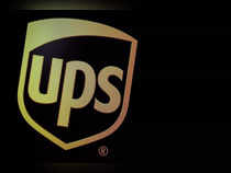 FILE PHOTO: FILE PHOTO: The company logo for United Parcel Service (UPS), is displayed  on a screen at the NYSE in New York