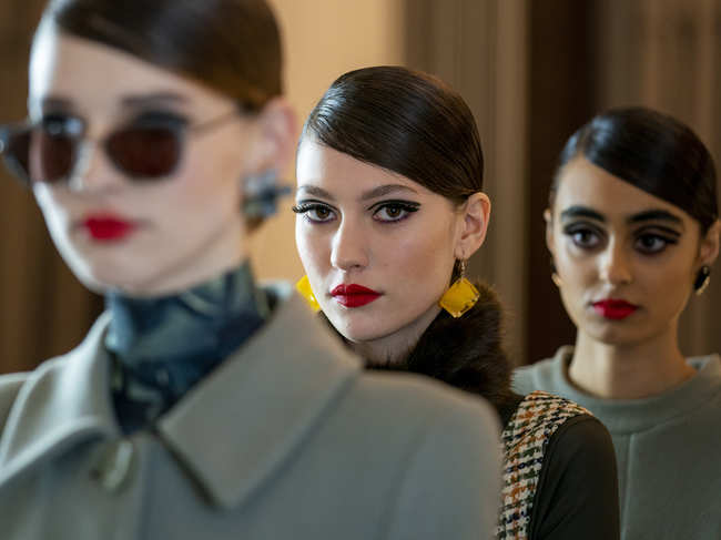 Models walk the runway at the finale of the Paul Costelloe show during London Fashion Week February 2021 at The Waldorf London on February 12, 2021 in London, England.