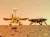 Chinese rover and lander pose for a group portrait on dusty, rocky Martian surface