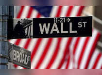 FILE PHOTO: A Wall Street sign is pictured outside the New York Stock Exchange in New York