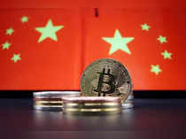 FILE PHOTO: Illustration picture of China flags and Bitcoin cryptocurrency