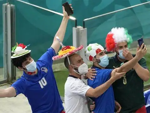 Fans wearing colourful hats