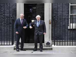 London : Britain's Prime Minister Boris Johnson, left, greets Australia's Prime ...