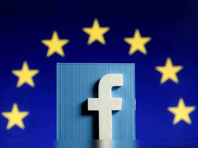 FILE PHOTO: Facebook logo in front of the EU flag