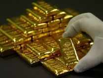 An employee sorts gold bars in the Austrian Gold and Silver Separating Plant 'Oegussa' in Vienna