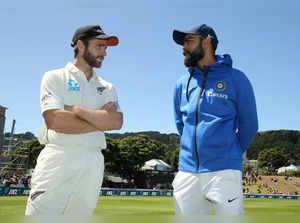 FILE PHOTO: New Zealand's Kane Williamson talks to India's Virat Kohli after New Zealand beat India in a test match at Basin Reserve, Wellington, New Zealand, February 24, 2020.