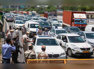 Gurugram: Delhi police set up a barricade to check vehicles at Delhi- Gurugram b...