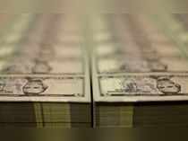 FILE PHOTO: Stacks of Lincoln five dollar bill are seen  at the Bureau of Engraving and Printing in Washington