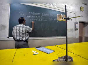 Sangli: A teacher records a session in an empty classroom after online classes r...