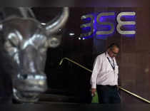 FILE PHOTO: A man walks out of the Bombay Stock Exchange (BSE) building in Mumbai