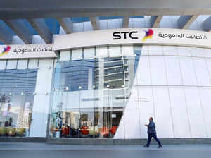 A man passes the Saudi Telecom STC office in Riyadh
