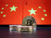 Illustration picture of China flags and Bitcoin cryptocurrency