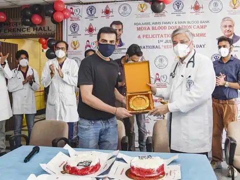 Felicitating AIIMS Director