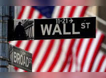 FILE PHOTO: FILE PHOTO: A Wall Street sign is pictured outside the New York Stock Exchange in New York