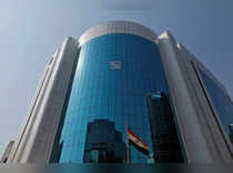 FILE PHOTO: The logo of the Securities and Exchange Board of India (SEBI) is seen on the facade of its headquarters building in Mumbai