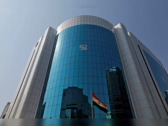 FILE PHOTO: The logo of the Securities and Exchange Board of India (SEBI) is seen on the facade of its headquarters building in Mumbai