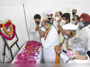 Lucknow: UP Congress President Lallu Singh pays tribute to former Prime Minister...