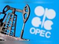 FILE PHOTO: A 3D-printed oil pump jack in front of the OPEC logo in this illustration picture