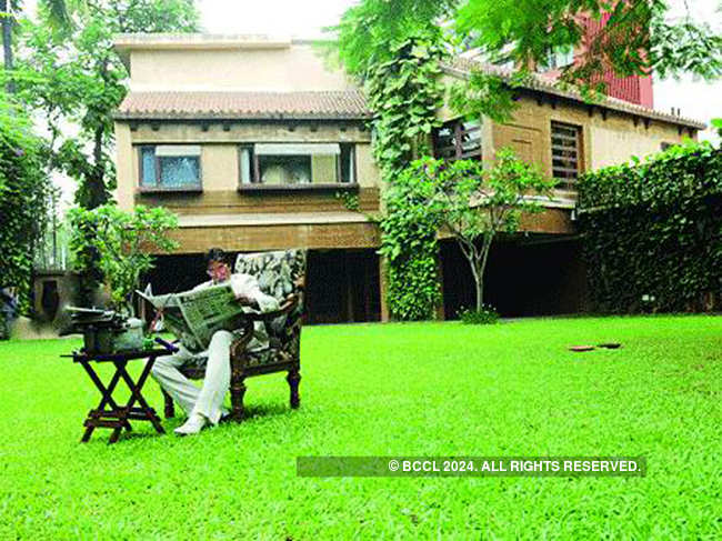 ​ Amitabh Bachchan reading newspaper at his bungalow, Prateeksh​a.