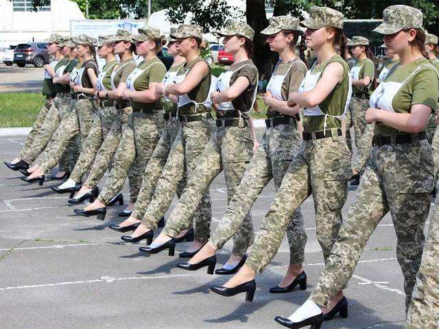 ​Women soldiers parade in heels