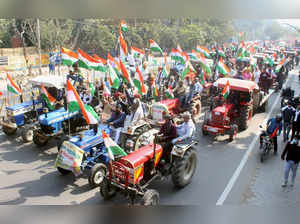 Gurugram: Farmers participate in a tractor march on Republic Day, as part of the...