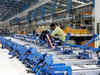India's factory output rises, retail inflation softens
