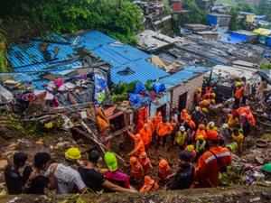 Rain fury kills 33 in Mumbai, cripples air, rail, road traffic
