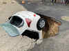 Delhi: Road caves in Dwarka due to incessant rain, car got stuck inside
