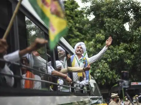 Farmers in buses