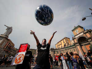 People demonstrate on the sidelines of a G20 environment meeting, in Naples, Italy, Thursday, July 22, 2021. AP
