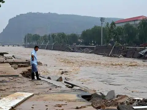 ​A road damaged by flooding