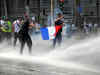 Paris: Police use tear gas, water canons against protesters opposed to COVID restrictions