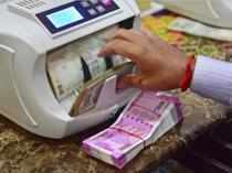 Rupee pares early losses, settles 6 paise higher at 74.40/USD