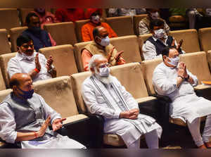 New Delhi: Prime Minister Narendra Modi with Defence Minister Rajnath Singh, BJP...