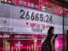 Shanghai shares edge lower, yuan firm as state media urges calm