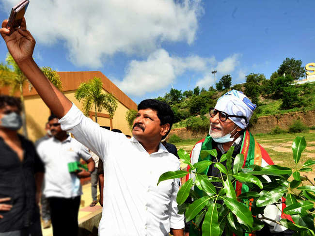 ​Rajya Sabha MP Joginipally Santosh Kumar takes a selfie with Amitabh Bachchan during the Green India Challenge program at Ramoji Film City, in Hyderabad.​