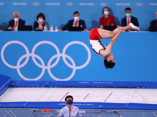 Ryosuke Sakai of Team Japan competes as judges look on during the Men's Qualification on day eight of the Tokyo 2020 Olympic Games at Ariake Gymnastics Centre on July 31, 2021 in Tokyo, Japan.