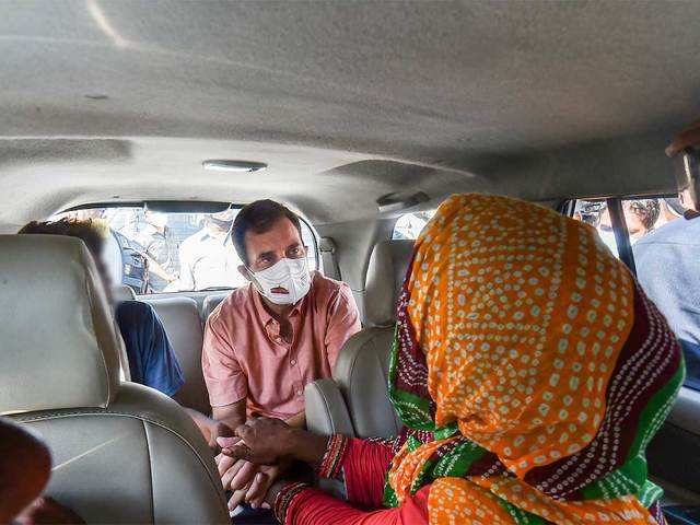 ​Rahul Gandhi with rape victim's family