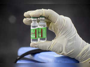 Prayagraj: A medic shows Covid-19 vaccine vials at a hospital in Prayagraj. (PTI...