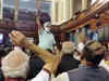 Ruckus in Rajya Sabha over farm bills; Opposition MPs seen standing on table