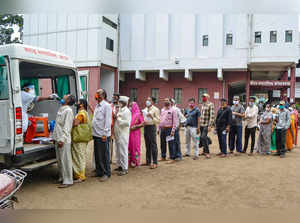 Karad: Beneficiaries wait to give samples for COVID-19 tests before receiving va...
