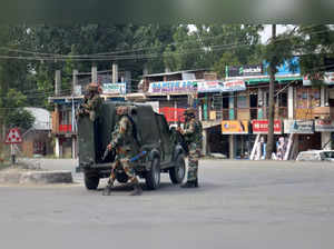 Kulgam: Security personnel during an encounter with militants after they opened ...