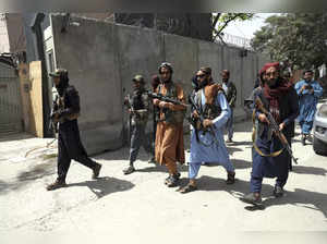 Kabul: Taliban fighters patrol in Wazir Akbar Khan neighborhood in the city of K...