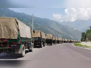 Kullu: Army vehicles move towards Ladakh on the Manali-Leh Highway in Kullu dist...