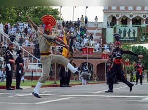 Border Security Force personnel and Pakistani Rangers during the Beati...