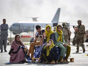 Evacuee children wait for the next flight