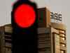 Sensex retreats from record high to close flat, Nifty ends at 16,635; Bajaj Finserv tanks 3%